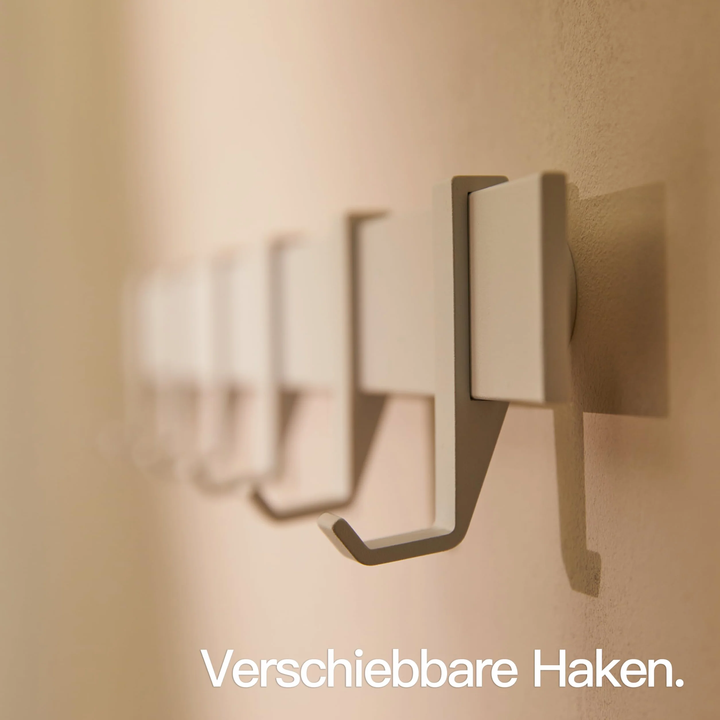 Designfabrik Hamburg Wieszaki ścienne na płaszcze | Metalowa szafiarka | Wieszak na płaszcze | Hak na płaszcz do ściany | Nowoczesny wieszak z przesuwanymi hakkami | 58 cm | Matowo biały